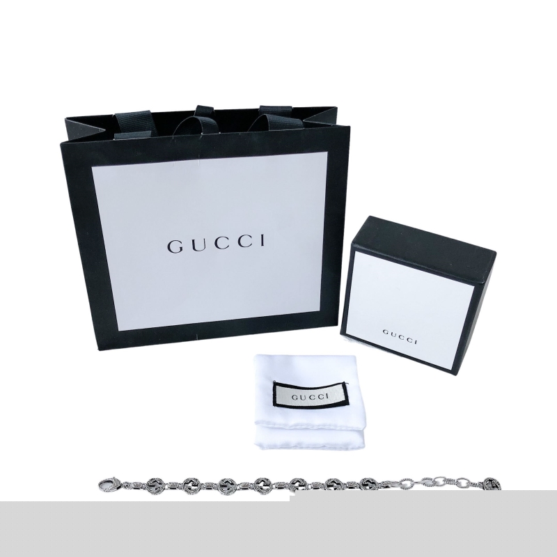 G*u*i bracelets